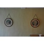 Two round oak framed prints