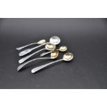 Six English sterling silver condiment spoons most with gilt bowls marked as follows London 1834 (