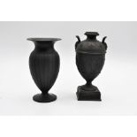 Wedgwood black basalt vases, one vase and one urn