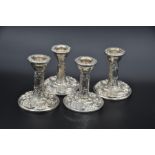 Set of 4 English sterling silver candlesticks, Birmingham, various 20th century dates (1950's), W