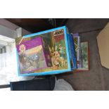 Large quantity of puzzles with a puzzle kaddy folder
