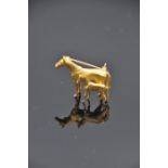 9ct Gold mare and foal brooch 14.4 grams