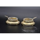 Pair of French sterling silver gilt salts, marked with French purity mark c. 1910, decorated with