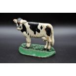 Cast iron cow doorstop