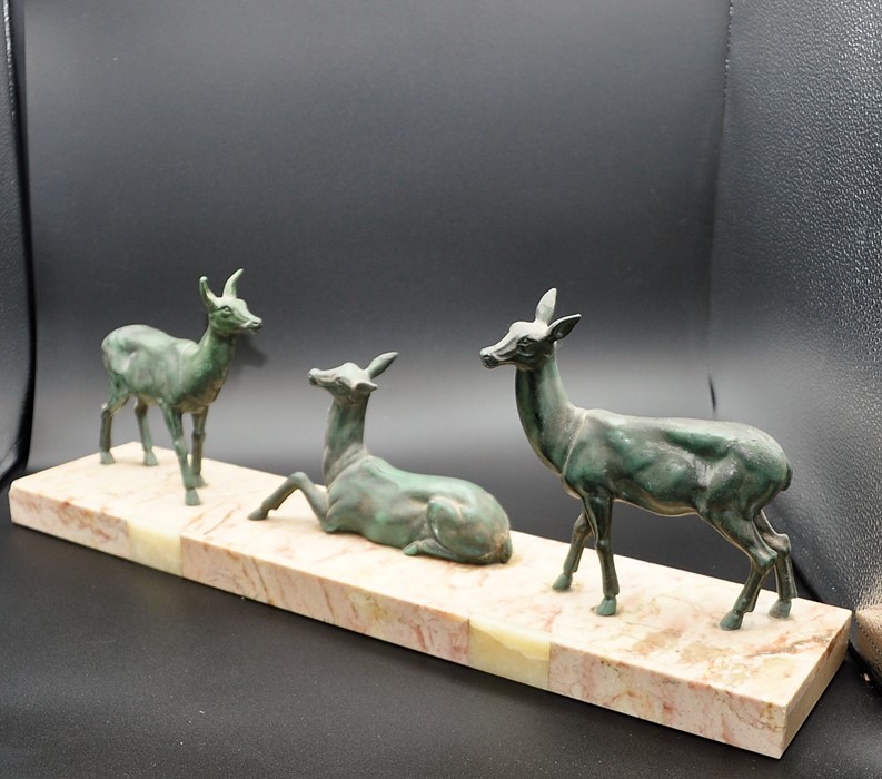 3 bronze sculptures of fallow deer on a marble base, 56cm long x 20cm tall