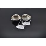 Two English sterling silver salts in the form of scallop shells with ball feet, Birmingham 1897 (x),