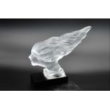 A Desna frosted glass 'Spirit of the Wind' car mascot, the Art Deco style sculpture raised on a