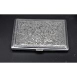 Persian sterling silver cigarette case c 1900-1925, both sides intricately hand embossed with