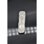 Chinese white metal ingot marked with various Chinese characters 143 grams 9.5 grams
