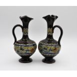 Two Doulton Lambeth incised and beaded jugs,