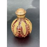 French perfume flask c1900, onion shaped cranberry glass with openwork gilt-bronze decoration to