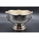 Silver plated punch bowl with lion head handles, 27 di x 18cm tall