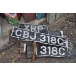 Various vintage number plates including steam engine plates