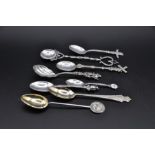 Eight English and continental souvenir teaspoons incl, English handmade spoon topped and tailed with