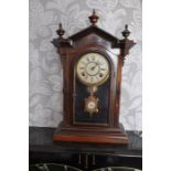 8 day and 1 day brass clock in mahogany case, Welch Spring & Co Forestville, Conneticut 35 x 58 cm