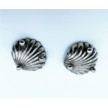 Two English sterling silver salts in the form of scallop shells with ball feet,