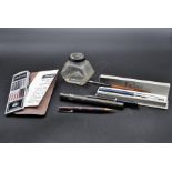 Collection of pens to incl Parker plus vintage Watermans ink bottle and arithma addiator