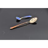 Two sterling silver and enamel continental condiment spoons, both marked, 12.1 grams