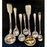 Seven English sterling silver condiment spoons as follows London 1820 (e) maker Thomas Wilkes Barker