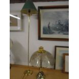 2 lamps, both brass bases, one with glass shade and tall one with green shade, small chip in one