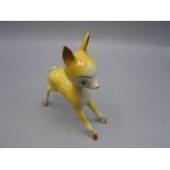 Ceramic Bambi 5 inches wide 6 inches tall ( no obvious damage )