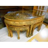 Oriental Carved Oval Table with 6 pull out stools below. 50 x 30 inches 20 tall