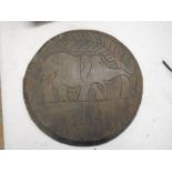 Treen plaque depicting elephants, 39cm across