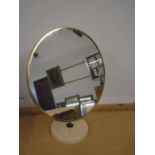 Retro vanity mirror, gold coloured metal trim with a plastic base 16" across, 20" tall