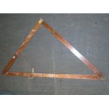 A military mahogany artillery folding square with spirit level and plumb bob