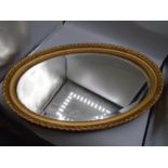 Vintage oval gilt bevelled mirror