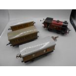 Hornby 0 Gauge Tank Locomotive and 3 Carriages ( no boxes )