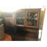 Display cabinet with lead glazed doors and carved design ( 2 pieces)
