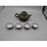 Japanese Ceramic Teapot 3 inches tall and 4 Saki cups