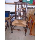 Oak rush seat armed chair