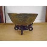 Brass Oriental bowl on stand, heavy and stamped on the bottom
