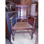 Vintage oak bobbin leg arm chair