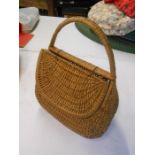 Wicker Basket with lid 14 inches wide at base 16 inches tall including handle