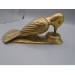 Brass woodpecker door knocker