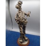 Bronze coloured clown figure 17" tall. damage to hand