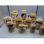 Collection of ceramic beer steins some as found