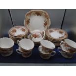 Part tea set comprising of 12 saucers, 8 cups, 2 cake/sandwich plates, 11 side plates, milk jug