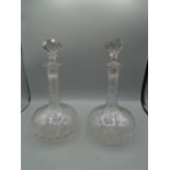 Pair of decanters, stopper on one is broken at the bottom