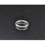 A plain polished platinum wedding band, ring size P, weight approx 4.6g