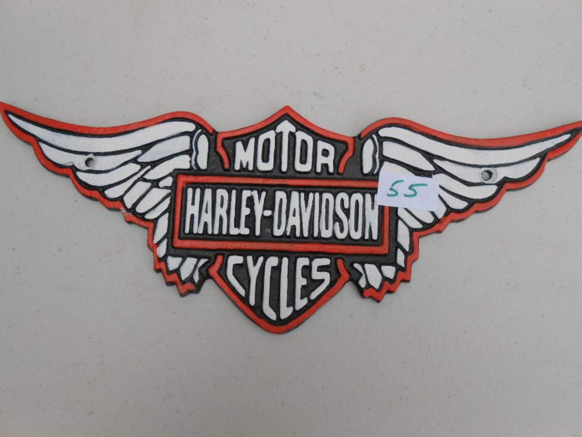 L. Harley Davidson wings plaque