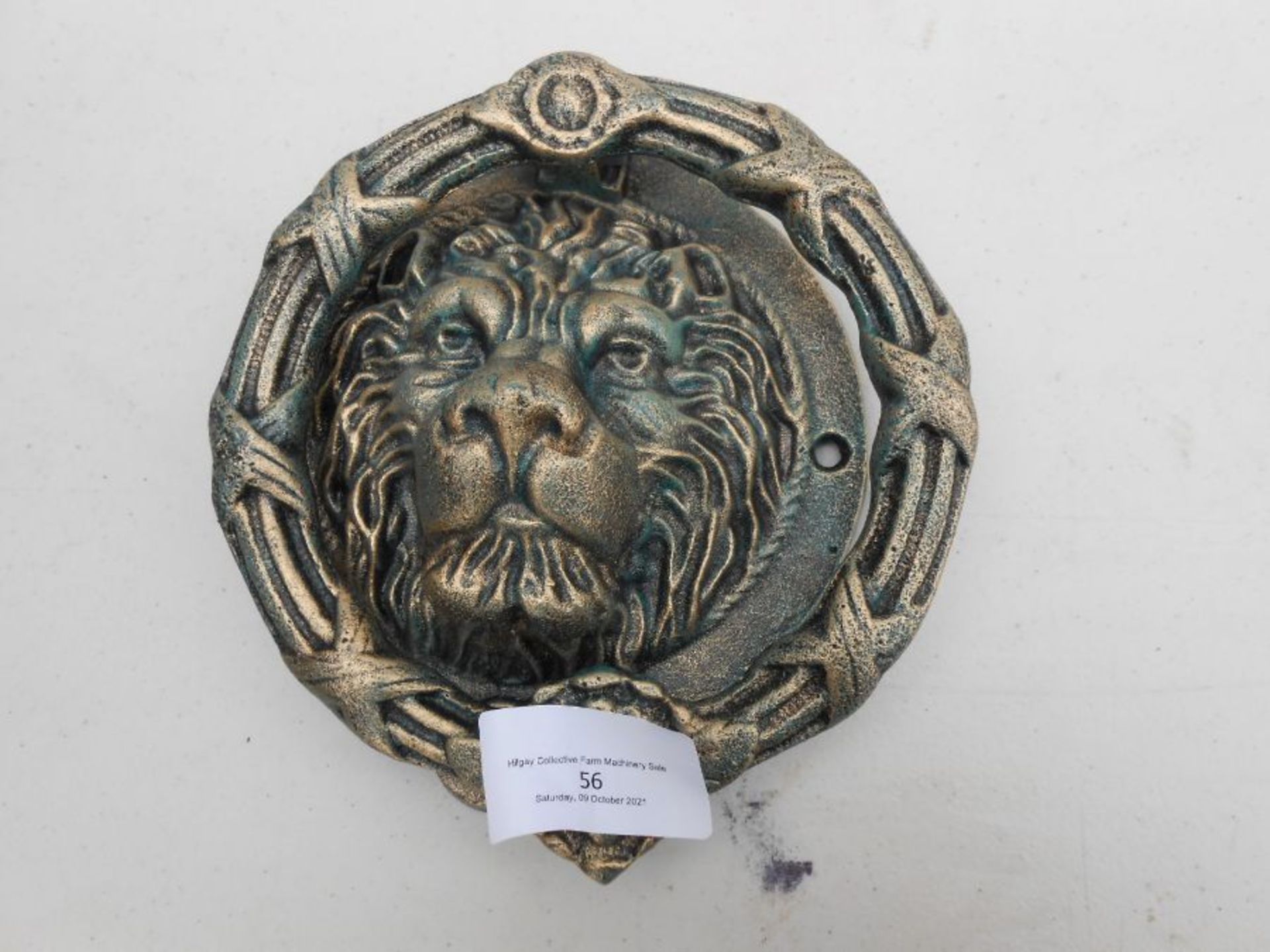 Lion head door knocker