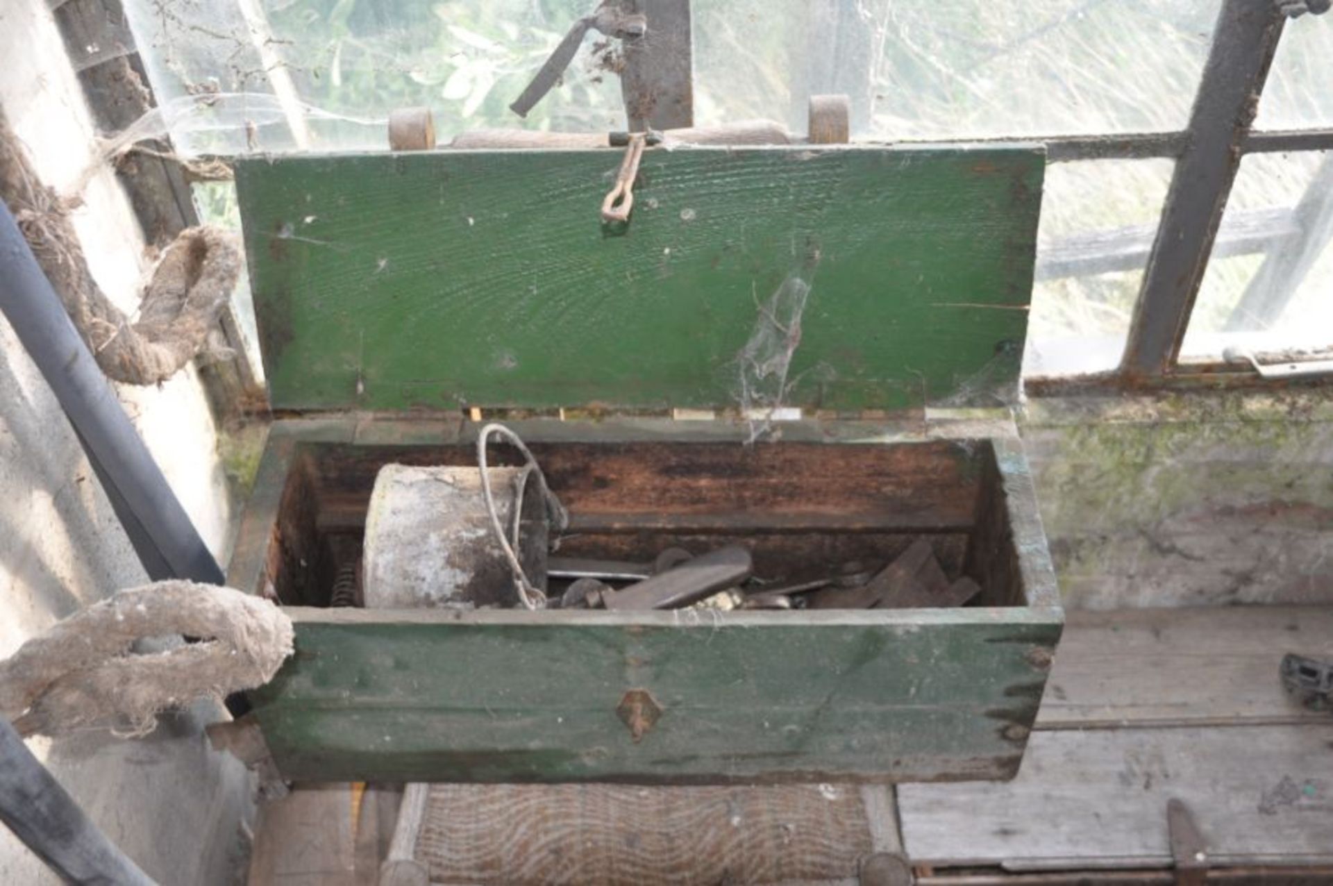 Green wooden toolbox and contents of tools