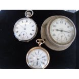 A bag containing two pocket watches - one silver coloured metal the other gold coloured metal, and