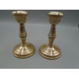 pair of silver candlesticks 11cm tall