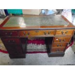 twin pedestal writing desk with green leather inlay top