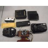 vintage cameras including Kodak instamatic, pentax, Halina and cameo folding camera with plates